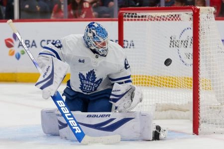 Dec 2, 2025; Sunrise, Florida, USA; Toronto Maple Leafs goaltender Joseph Woll (60) makes a save against the Florida Panthers during the first period at Amerant Bank Arena.