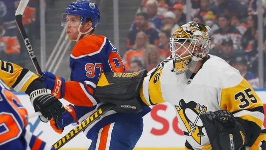 Pittsburgh Penguins' Tristan Jarry pushes away Edmonton Oilers' Connor McDavid