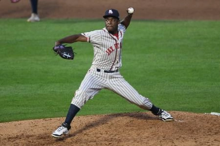 John Simon pitching in the minor leagues