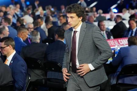 Jun 28, 2024; Las Vegas, Nevada, USA; Ben Danford is selected by the Toronto Maple Leafs with the 31st overall pick in the first round of the 2024 NHL Draft at The Sphere.