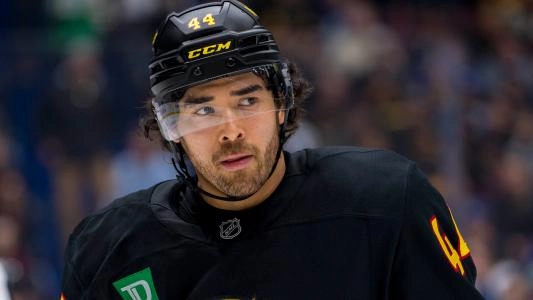 Vancouver Canucks' Kiefer Sherwood looks on during a game