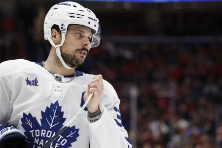 Dec 18, 2025; Washington, District of Columbia, USA; Toronto Maple Leafs center Auston Matthews (34) holds the bade of his stick prior to a face-off against the Washington Capitals during the third period at Capital One Arena. Mandatory Credit: Geoff Burke-Imagn Images