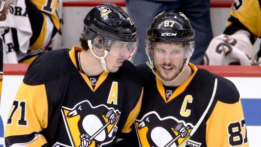 Pittsburgh Penguins' Evgeni Malkin and Sidney Crosby side by side in a game