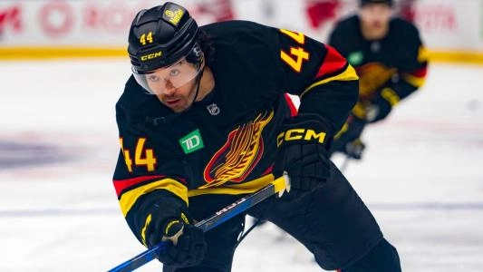 Vancouver Canucks' Kiefer Sherwood takes a shot on net
