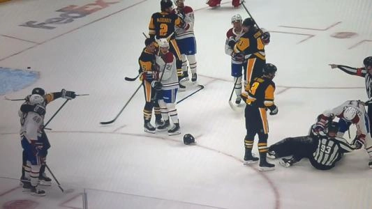 Injured linesman Ryan Jackson seen on the ice during the Penguins-Canadiens game