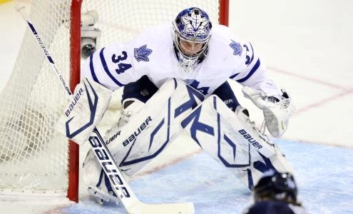 Feb 7, 2013; Winnipeg, MB, CAN; Toronto Maple Leafs goalie James Reimer (34) sets for a shot during the first period against the Winnipeg Jets at the MTS Centre