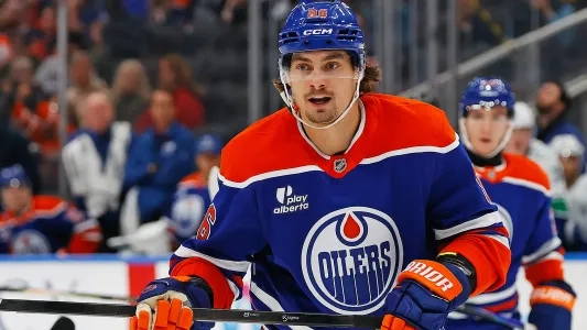 Edmonton Oilers' David Tomasek holds his stick during a game