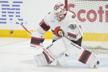 Dec 27, 2025; Toronto, Ontario, CAN; Ottawa Senators goaltender Linus Ullmark (35) goes to make a save during warm up before a game against the Toronto Maple Leafs at Scotiabank Arena
