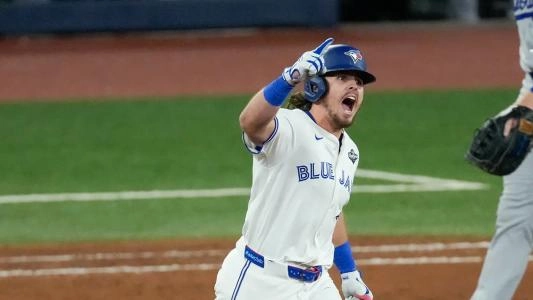 Addison Barger rounds the bases after hitting a pinch-hit Grand Slam in Game 1 of the 2025 World Series