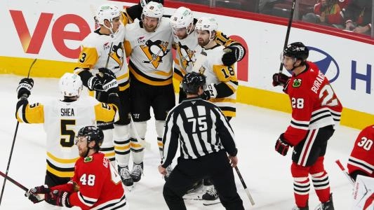 Pittsburgh Penguins' Justin Brazeau celebrates a goal with his team