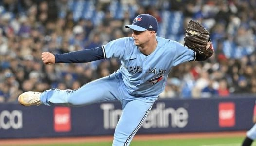Apr 26, 2023; Toronto, Ontario, CAN; Toronto Blue Jays relief pitcher Trevor Richards (33) delivers a pitch against the Chicago White Sox in the ninth inning at Rogers Centre. Mandatory Credit: Dan Hamilton-Imagn Images