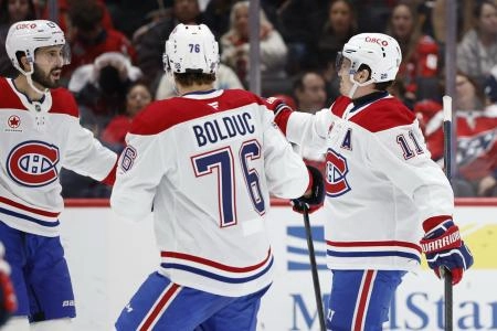 Jan 13, 2026; Washington, District of Columbia, USA; Montréal Canadiens right wing Brendan Gallagher (11) celebrates with teammates after scoring a goal against the Washington Capitals during the second period at Capital One Arena. Mandatory Credit: Geoff Burke-Imagn Imag