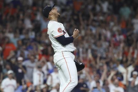 Sep 16, 2025; Houston, Texas, USA; Houston Astros relief pitcher Bryan Abreu (52) reacts after the final out during the ninth inning against the Texas Rangers at Daikin Park.