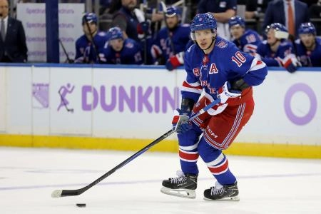 Jan 5, 2026; New York, New York, USA; New York Rangers left wing Artemi Panarin (10) skates with the puck against the Utah Mammoth during the second period at Madison Square Garden.