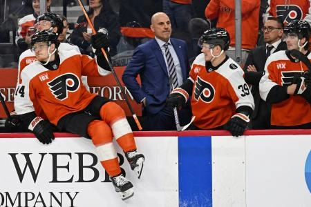 Oct 13, 2025; Philadelphia, Pennsylvania, USA; Philadelphia Flyers head coach Rick Tocchet behind the bench against the Florida Panthers at Wells Fargo Center.