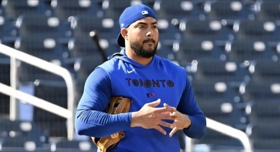 Oct 3, 2025; Toronto, Ontario, Canada; Toronto Blue Jays outfielder Anthony Santander (25) waits his turn at batting practice during workouts at Rogers Centre. Mandatory Credit: Dan Hamilton-Imagn Images