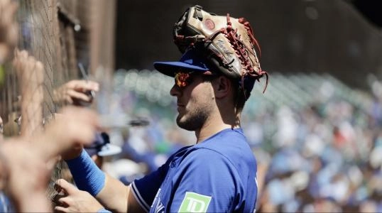 Jul 7, 2024; Seattle, Washington, USA; Toronto Blue Jays left fielder Daulton Varsho signs autographs pregame at T-Mobile Park. Mandatory Credit: John Froschauer-Imagn Images