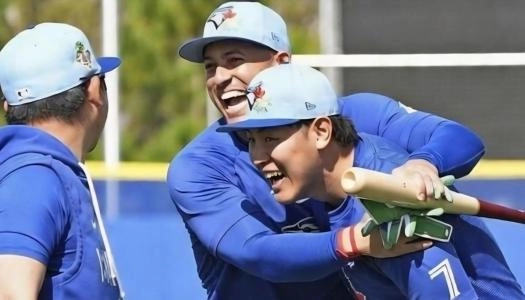 Toronto Blue Jays George Springer and Kazuma Okamoto horsing around, and having a laugh before the game.