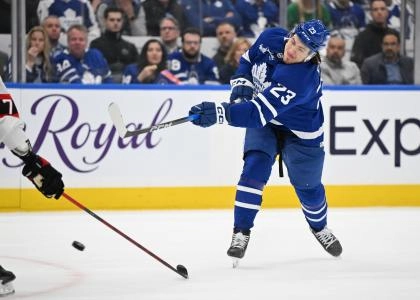 Apr 22, 2025; Toronto, Ontario, CAN; Toronto Maple Leafs forward Matthew Knies (23) shoots the puck against the Ottawa Senators in the first period in game two of the first round of the 2025 Stanley Cup Playoffs at Scotiabank Arena.