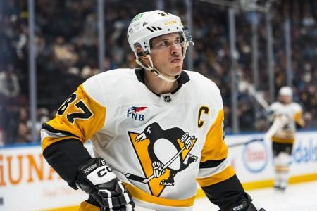 Jan 25, 2026; Vancouver, British Columbia, CAN; Pittsburgh Penguins forward Sidney Crosby (87) during a stop in play against the Vancouver Canucks in the second period at Rogers Arena. Mandatory Credit: Bob Frid-Imagn Images