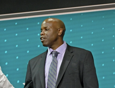 Jul 7, 2022; Montreal, Quebec, CANADA; Filip Bystedt shakes hands with San Jose Sharks general manager Mike Grier after being selected as the number twenty-seven overall pick to the San Jose Sharks in the first round of the 2022 NHL Draft at Bell Centre.