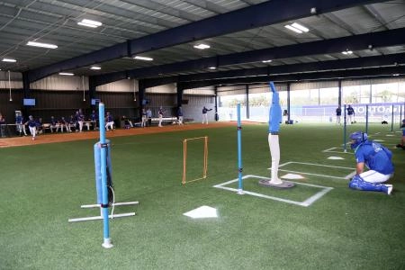 Feb 11, 2026; Dunedin, FL, USA; Toronto Blue Jays pitcher Chase Lee (52) and teammates throw a bullpen session for spring training practice at Blue Jays Player Development Complex.