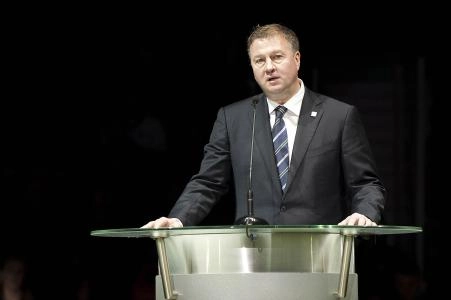 Dec 11, 2010; Vancouver, British Columbia, CANADA; Mike Gillis gives a speech as the Vancouver Canucks host Markus Naslund night to retire his jersey at Rogers Arena. Mandatory Credit: Anne-Marie Sorvin-Imagn Images