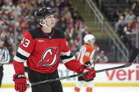 Apr 7, 2026; Newark, New Jersey, USA; New Jersey Devils defender Luke Hughes (43) takes a break during a stoppage in play against the Philadelphia Flyers during the first period at Prudential Center.