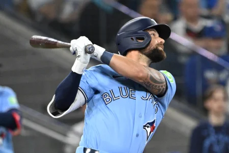 Mar 31, 2026; Toronto, Ontario, CAN; Toronto Blue Jays right fielder Nathan Lukes (38) hits single against the Colorado Rockies in the fifth inning at Rogers Centre