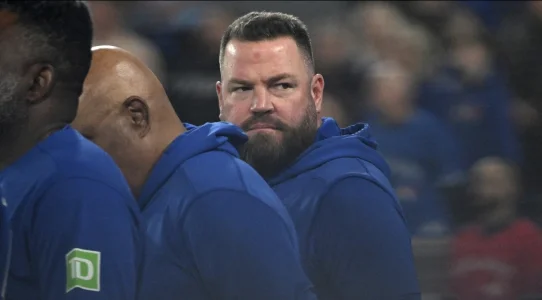 John Schneider reacts to Tyler Megill exchanging pleasantries with Blue Jays dugout