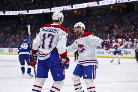 Apr 19, 2026; Tampa, Florida, USA; Montreal Canadiens forward Josh Anderson (17) and defenseman Alexandre Carrier (45) react to a goal that was later called back against the Tampa Bay Lightning during the second period in game one of the first round of the 2026 Stanley Cup Playoffs at Benchmark International Arena. Mandatory Credit: Morgan Tencza-Imagn Images