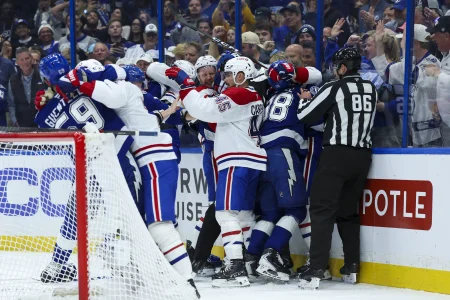Apr 21, 2026; Tampa, Florida, USA; the Tampa Bay Lightning fight with the Montreal Canadiens in the first period during game two of the first round of the 2026 Stanley Cup Playoffs at Benchmark International Arena.