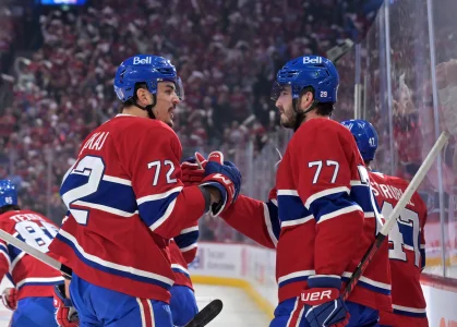 Apr 24, 2026; Montreal, Quebec, CAN; Montreal Canadiens defenseman Arber Xhekaj (72) celebrates with teammate forward Kirby Dach (77) after the goal scored by Montreal Canadiens forward Alexandre Texier (85) (not pictured) during the first period in game three of the first round of the 2026 Stanley Cup Playoffs at the Bell Centre.