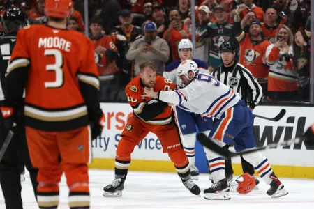Apr 24, 2026; Anaheim, California, USA; Anaheim Ducks left wing Jeffrey Viel (28) and Edmonton Oilers right wing Vasily Podkolzin (92) fight during the third period of game three of the first round of the 2026 Stanley Cup Playoffs at Honda Center.