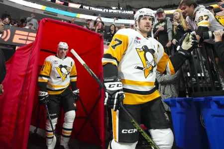 Nov 18, 2023; Raleigh, North Carolina, USA; Pittsburgh Penguins center Sidney Crosby (87) and center Evgeni Malkin (71) come out of the locker room for the warmups Carolina Hurricanes at PNC Arena.