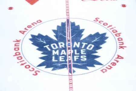 Apr 20, 2025; Toronto, Ontario, CAN; The Toronto Maple Leafs logo at center ice before game one of the first round of the 2025 Stanley Cup Playoffs against the Ottawa Senators at Scotiabank Arena.