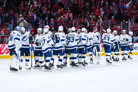 Apr 26, 2026; Montreal, Quebec, CAN; Tampa Bay Lightning players gather together to celebrate their win against the Montreal Canadiens after the end of game four of the first round of the 2026 Stanley Cup Playoffs at Bell Centre.
