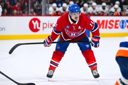 Mar 21, 2026; Montreal, Quebec, CAN; Montreal Canadiens right wing Brendan Gallagher (11) waits for a face-off against the New York Islanders during the third period at Bell Centre.