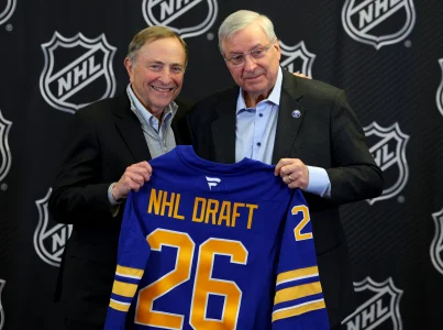 Jan 12, 2026; Buffalo, New York, USA; NHL Commissioner Gary Bettman and Buffalo Sabres owner Terry Pegula pose for a photo during a press conference announcing the 2026 NHL Draft taking place in Buffalo at KeyBank Center.