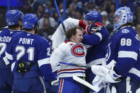 Apr 29, 2026; Tampa, Florida, USA; Montreal Canadiens right wing Brendan Gallagher (11) and Tampa Bay Lightning defenseman Erik Cernak (81) react after a whistle in the second period during game five of the first round of the 2026 Stanley Cup Playoffs at Benchmark International Arena.