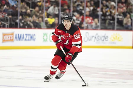 Apr 9, 2026; Newark, New Jersey, USA; New Jersey Devils center Jack Hughes (86) skates with the puck against the Pittsburgh Penguins during the second period at Prudential Center.