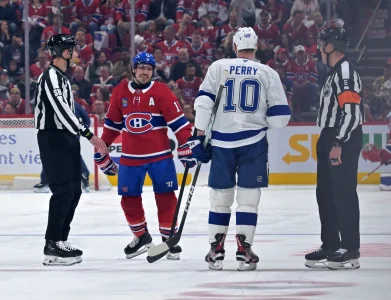 May 1, 2026; Montreal, Quebec, CAN; Montreal Canadiens forward Brendan Gallagher (11) and Tampa Bay Lightning forward Corey Perry (10) exchange words during the third period in game six of the first round of the 2026 Stanley Cup Playoffs at the Bell Centre.