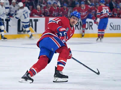 1er mai 2026; Montr�al, Qu�bec, Canada; Lattaquant des Canadiens de Montr�al, Brendan Gallagher (11), effectue un �chec-avant face au Lightning de Tampa Bay durant la premi�re p�riode du sixi�me match de la premi�re ronde des s�ries �liminatoires de la Coupe Stanley 2026 au Centre Bell.
