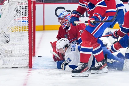 May 1, 2026; Montreal, Quebec, CAN; Tampa Bay Lightning forward Gage Goncalves (93) scores the winning goal against Montreal Canadiens goalie Jakub Dobes (75) during the overtime period in game six of the first round of the 2026 Stanley Cup Playoffs at the Bell Centre.