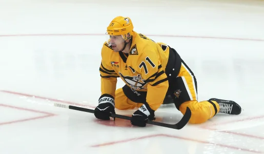 Apr 27, 2026; Pittsburgh, Pennsylvania, USA; Pittsburgh Penguins center Evgeni Malkin (71) stretches on the ice to warm up against the Philadelphia Flyers in game five of the first round of the 2026 Stanley Cup Playoffs at PPG Paints Arena.