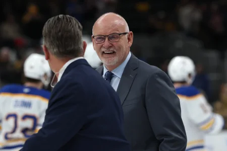 May 1, 2026; Boston, Massachusetts, USA; Buffalo Sabres head coach Lindy Ruff smiles after their 4-1 win over the Boston Bruins in game six of the first round of the 2026 Stanley Cup Playoffs at TD Garden.