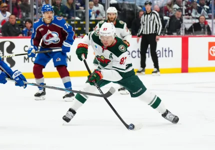 May 3, 2026; Denver, Colorado, USA; Minnesota Wild left wing Kirill Kaprizov (97) prepares to take a shot on goal against the Colorado Avalanche during the first period in game one of the second round of the 2026 Stanley Cup Playoffs at Ball Arena.
