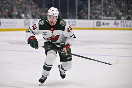 Apr 28, 2026; Dallas, Texas, USA; Minnesota Wild defenseman Quinn Hughes (43) skates against the Dallas Stars in game five of the first round of the 2026 Stanley Cup Playoffs at American Airlines Center.