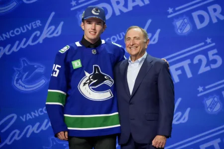Jun 27, 2025; Los Angeles, California, USA; Braeden Cootes is selected as the 16th overall pick to the Vancouver Canucks in the first round of the 2025 NHL Draft at Peacock Theater.