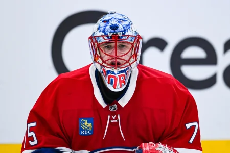 Apr 26, 2026; Montreal, Quebec, CAN; Montreal Canadiens goalie Jakub Dobes (75) looks on against the Tampa Bay Lightning during the second period in game four of the first round of the 2026 Stanley Cup Playoffs at Bell Centre.